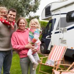 Portrait Of Family Enjoying Camping in an RV